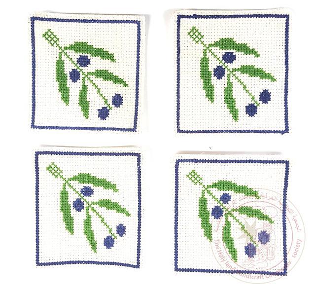 Embroidery coaster featuring an olive branch,