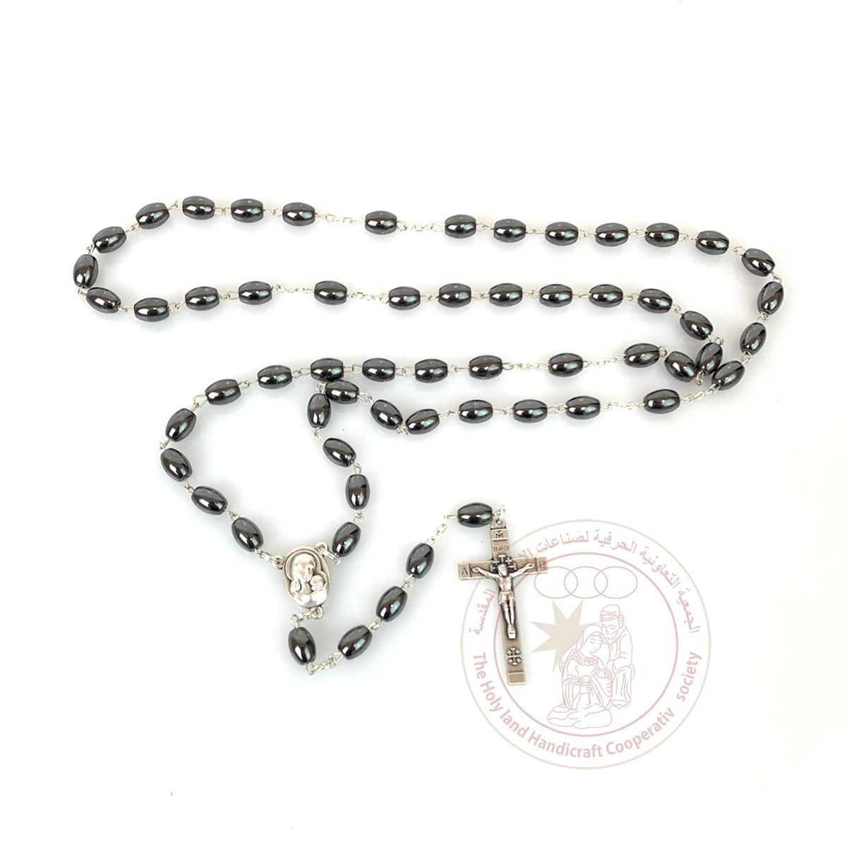 Hematite Oval Beads Rosary silver plated cross , icon and holy soil glass